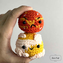 Cargar imagen en el visor de la galería, Hand holding cute Venus and Mars crocheted planets with a clean white background.