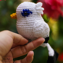 Cargar imagen en el visor de la galería, White Bali Myna crochet bird doll with yellow beak and blue eye details
